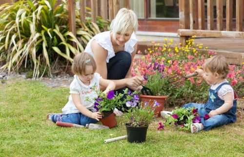 Happy homeowners with their cleared garden