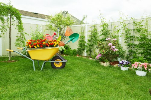 Before and after garden clearance in Feltham